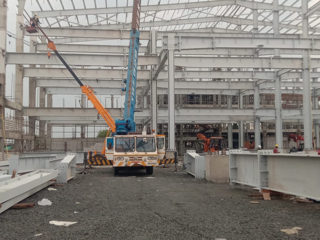 MEC engineers on a steel mezzanine during construction